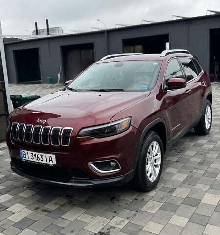Червоний Джип Cherokee, об'ємом двигуна 2.4 л та пробігом 83 тис. км за 16000 $, фото 1 на Automoto.ua