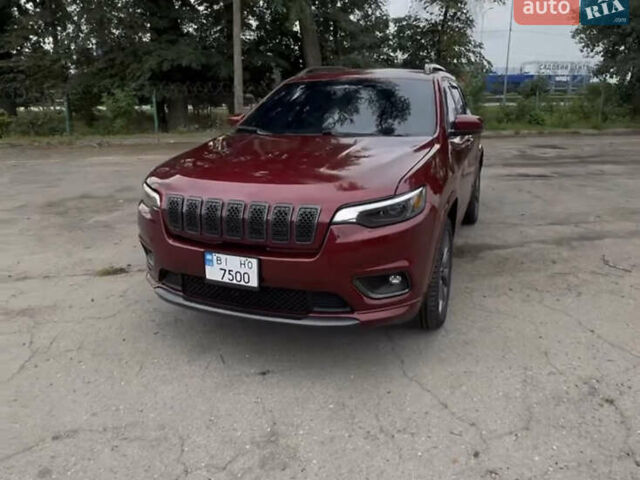 Красный Джип Чероки, объемом двигателя 2 л и пробегом 58 тыс. км за 17800 $, фото 2 на Automoto.ua