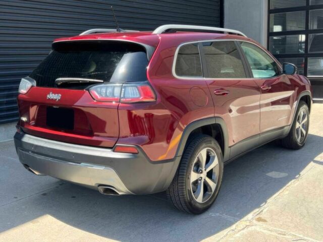 Червоний Джип Cherokee, об'ємом двигуна 3.2 л та пробігом 66 тис. км за 16400 $, фото 4 на Automoto.ua