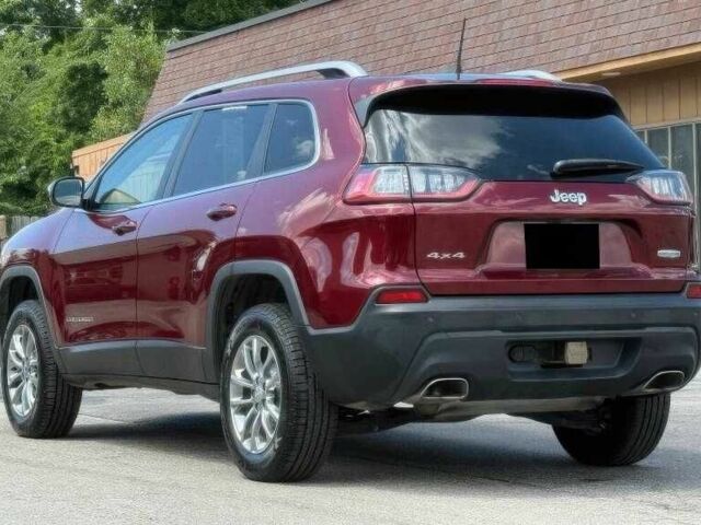 Красный Джип Чероки, объемом двигателя 3.2 л и пробегом 68 тыс. км за 12000 $, фото 4 на Automoto.ua