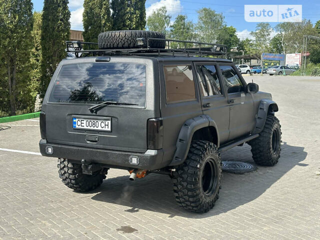 Джип Cherokee, об'ємом двигуна 4 л та пробігом 164 тис. км за 17900 $, фото 7 на Automoto.ua