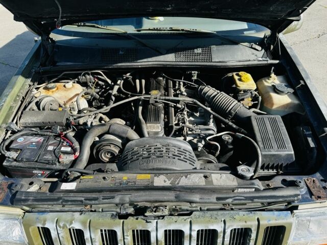 Серый Джип Чероки, объемом двигателя 4 л и пробегом 3 тыс. км за 2700 $, фото 1 на Automoto.ua