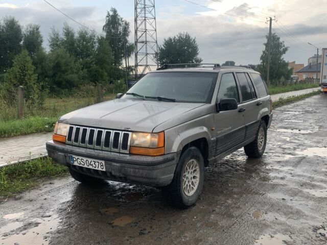 Серый Джип Чероки, объемом двигателя 2.5 л и пробегом 300 тыс. км за 2350 $, фото 2 на Automoto.ua