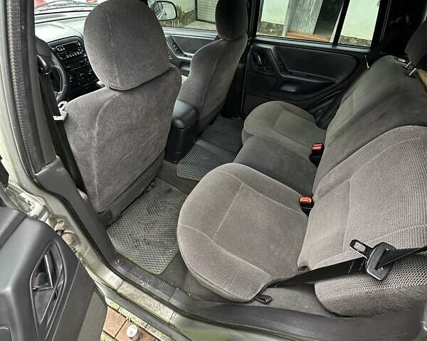 Сірий Джип Cherokee, об'ємом двигуна 3.12 л та пробігом 177 тис. км за 7300 $, фото 3 на Automoto.ua