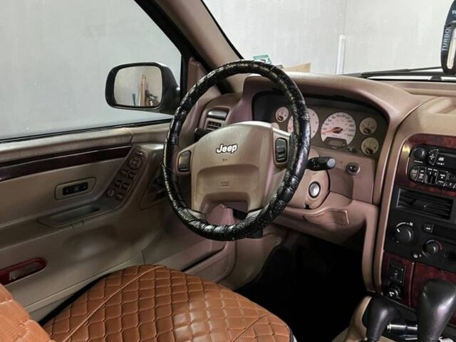 Серый Джип Чероки, объемом двигателя 3.1 л и пробегом 300 тыс. км за 5400 $, фото 11 на Automoto.ua