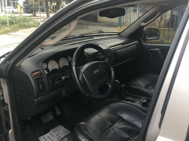 Серый Джип Чероки, объемом двигателя 2.7 л и пробегом 441 тыс. км за 9100 $, фото 4 на Automoto.ua