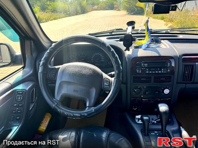 Сірий Джип Cherokee, об'ємом двигуна 3.1 л та пробігом 240 тис. км за 3700 $, фото 5 на Automoto.ua