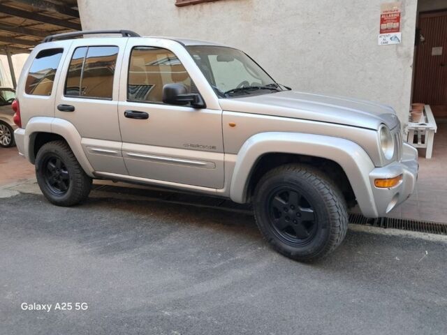 Сірий Джип Cherokee, об'ємом двигуна 10 л та пробігом 3 тис. км за 3373 $, фото 1 на Automoto.ua