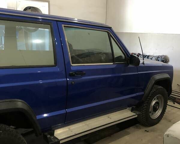 Синій Джип Cherokee, об'ємом двигуна 2.5 л та пробігом 150 тис. км за 7500 $, фото 1 на Automoto.ua