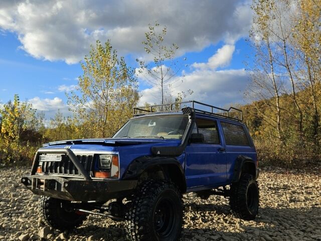 Синий Джип Чероки, объемом двигателя 2.5 л и пробегом 100 тыс. км за 6999 $, фото 1 на Automoto.ua