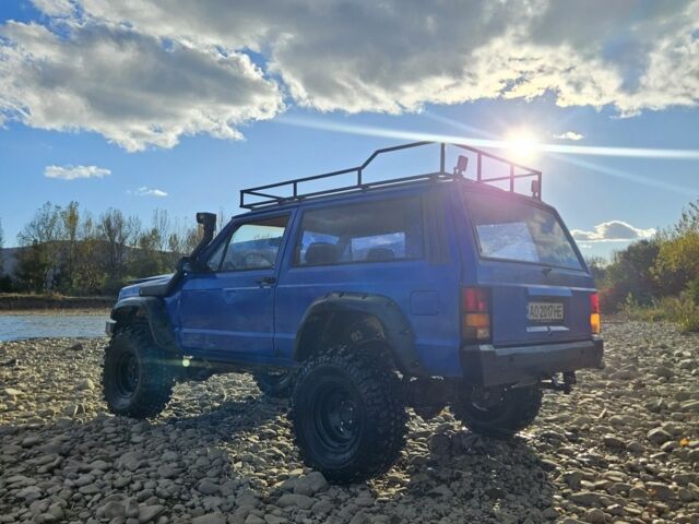 Синий Джип Чероки, объемом двигателя 2.5 л и пробегом 100 тыс. км за 6999 $, фото 2 на Automoto.ua