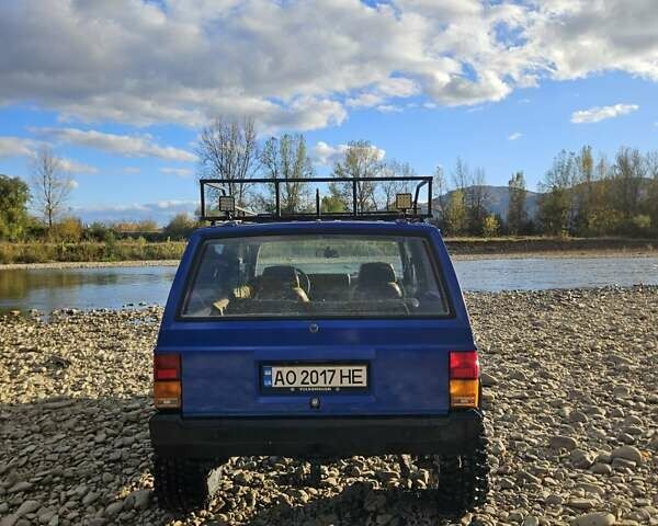 Синий Джип Чероки, объемом двигателя 2.5 л и пробегом 100 тыс. км за 6999 $, фото 3 на Automoto.ua