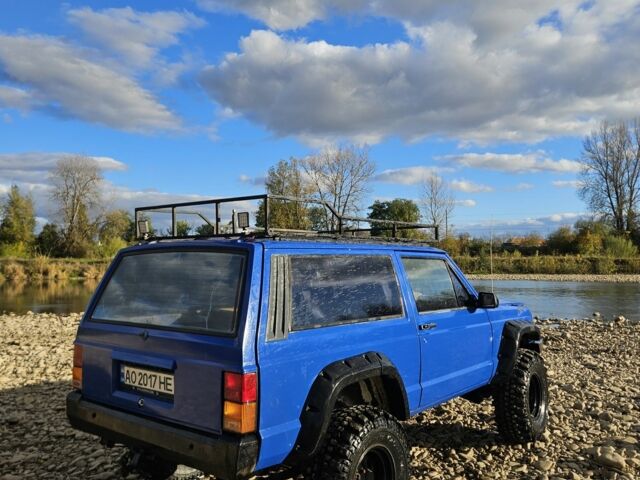 Синий Джип Чероки, объемом двигателя 2.5 л и пробегом 100 тыс. км за 6999 $, фото 4 на Automoto.ua