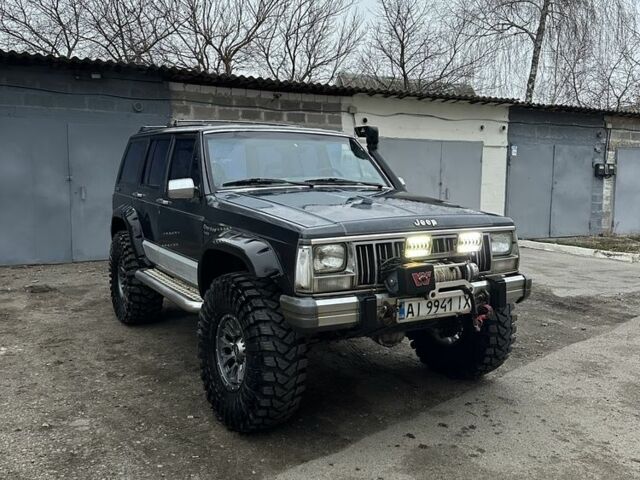 Синий Джип Чероки, объемом двигателя 3 л и пробегом 100 тыс. км за 7200 $, фото 2 на Automoto.ua