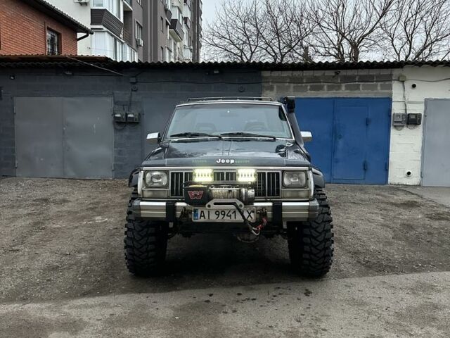 Синий Джип Чероки, объемом двигателя 3 л и пробегом 100 тыс. км за 7200 $, фото 1 на Automoto.ua