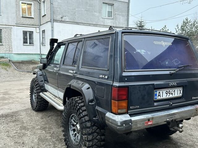 Синий Джип Чероки, объемом двигателя 3 л и пробегом 100 тыс. км за 7200 $, фото 4 на Automoto.ua