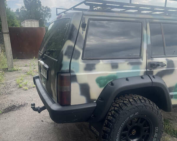 Синий Джип Чероки, объемом двигателя 2.5 л и пробегом 235 тыс. км за 12600 $, фото 3 на Automoto.ua