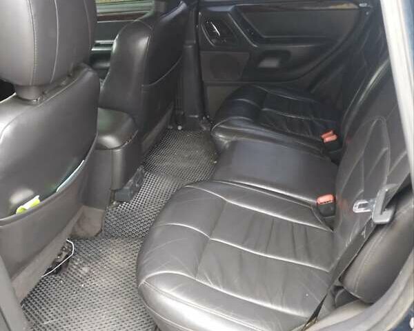 Синий Джип Чероки, объемом двигателя 3.13 л и пробегом 311 тыс. км за 5500 $, фото 2 на Automoto.ua