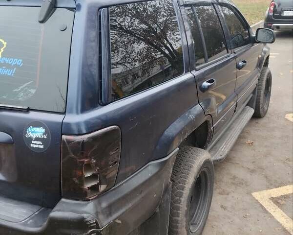 Синий Джип Чероки, объемом двигателя 3.13 л и пробегом 311 тыс. км за 5500 $, фото 3 на Automoto.ua