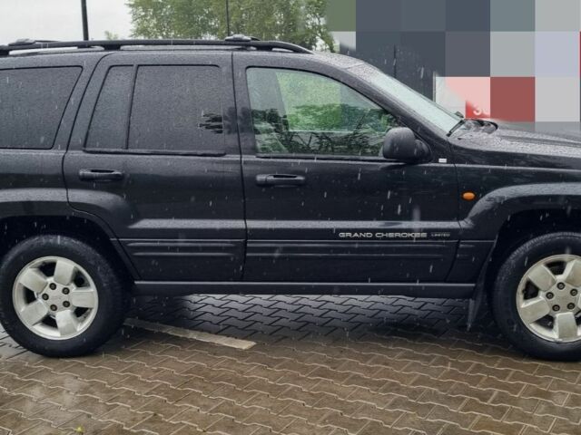 Синий Джип Чероки, объемом двигателя 2.7 л и пробегом 328 тыс. км за 5000 $, фото 6 на Automoto.ua