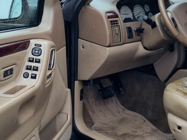 Синий Джип Чероки, объемом двигателя 2.7 л и пробегом 328 тыс. км за 5000 $, фото 7 на Automoto.ua