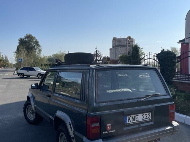 Зелений Джип Cherokee, об'ємом двигуна 2.1 л та пробігом 235 тис. км за 3100 $, фото 7 на Automoto.ua