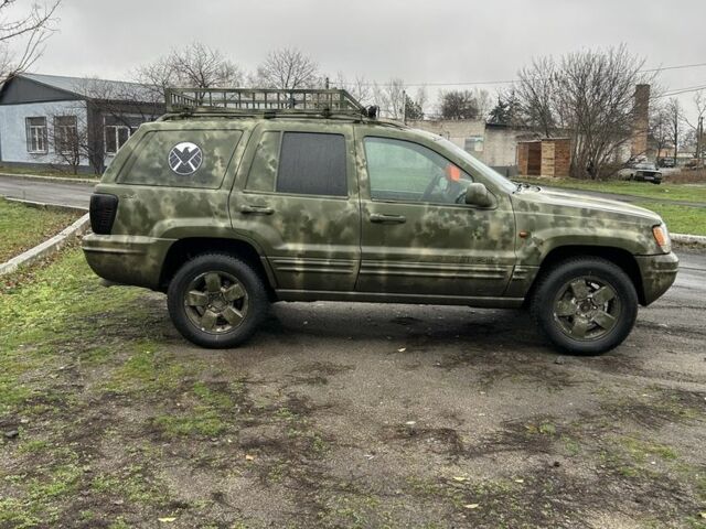 Зеленый Джип Чероки, объемом двигателя 3.1 л и пробегом 335 тыс. км за 2999 $, фото 1 на Automoto.ua