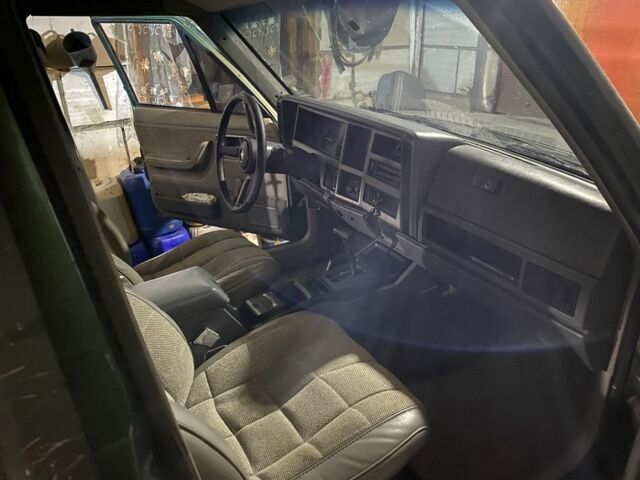 Зеленый Джип Чероки, объемом двигателя 4 л и пробегом 390 тыс. км за 6500 $, фото 1 на Automoto.ua