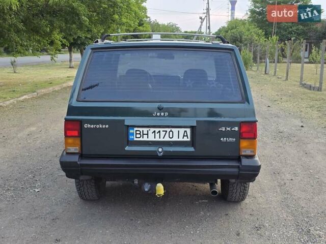 Зеленый Джип Чероки, объемом двигателя 4 л и пробегом 247 тыс. км за 5800 $, фото 6 на Automoto.ua