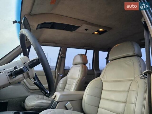 Зеленый Джип Чероки, объемом двигателя 4 л и пробегом 247 тыс. км за 5800 $, фото 24 на Automoto.ua