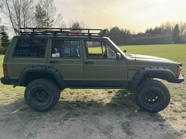 Зелений Джип Cherokee, об'ємом двигуна 4 л та пробігом 244 тис. км за 9500 $, фото 5 на Automoto.ua