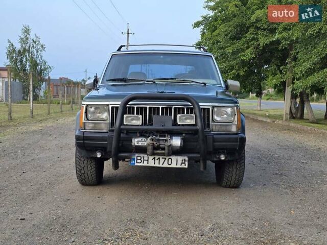 Зеленый Джип Чероки, объемом двигателя 4 л и пробегом 247 тыс. км за 5800 $, фото 1 на Automoto.ua