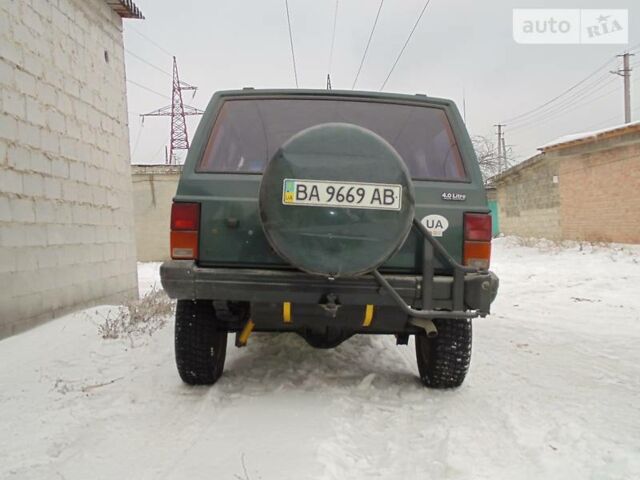 Зелений Джип Cherokee, об'ємом двигуна 4 л та пробігом 215 тис. км за 6500 $, фото 3 на Automoto.ua