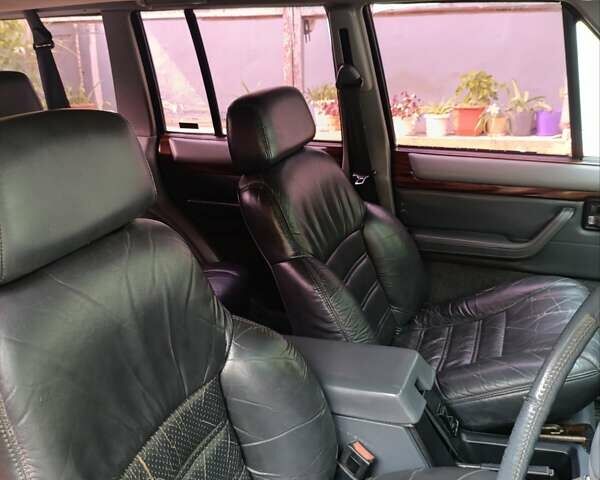 Зеленый Джип Чероки, объемом двигателя 4 л и пробегом 123 тыс. км за 4300 $, фото 5 на Automoto.ua