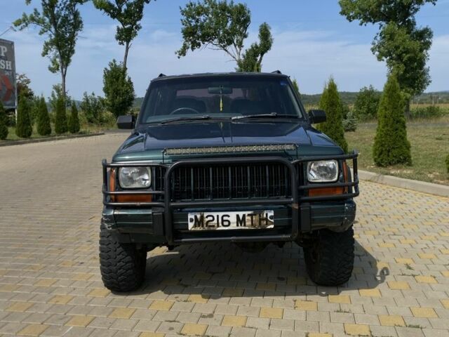 Зеленый Джип Чероки, объемом двигателя 4 л и пробегом 123 тыс. км за 4300 $, фото 1 на Automoto.ua