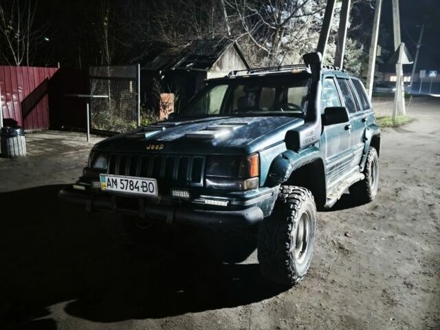 Зелений Джип Cherokee, об'ємом двигуна 5.2 л та пробігом 250 тис. км за 4500 $, фото 1 на Automoto.ua