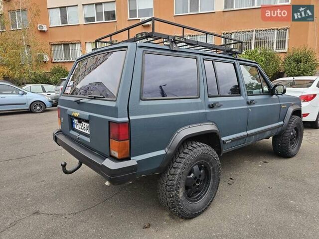 Джип Чероки 1995 в Одессе на Automoto.ua Зеленый Джип Чероки, объемом двигателя 2.5 л и пробегом 220 тыс. км за 6300 $, фото 8 на Automoto.ua