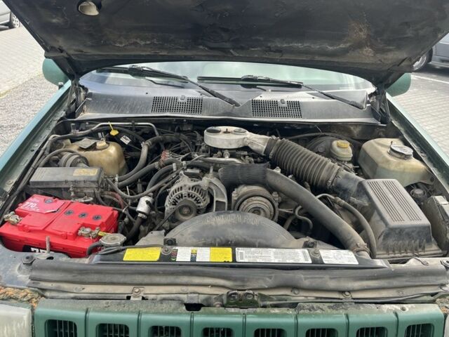 Зеленый Джип Чероки, объемом двигателя 5.2 л и пробегом 360 тыс. км за 5700 $, фото 5 на Automoto.ua