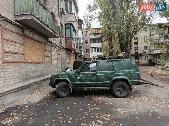Зеленый Джип Чероки, объемом двигателя 2.5 л и пробегом 300 тыс. км за 2000 $, фото 2 на Automoto.ua