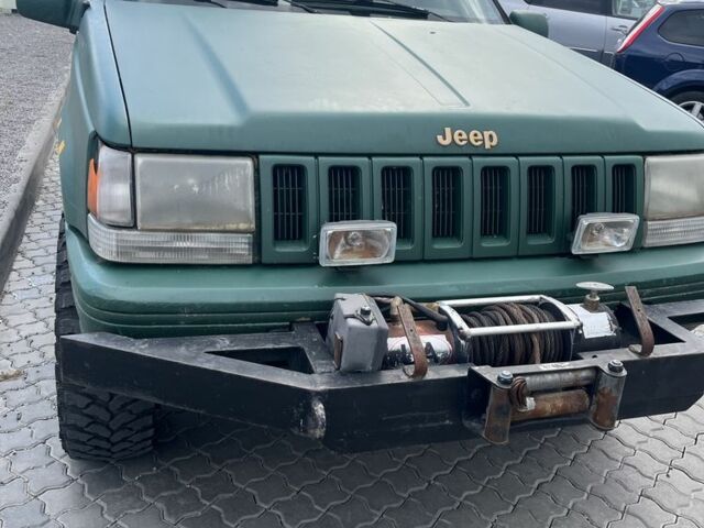 Зеленый Джип Чероки, объемом двигателя 5.2 л и пробегом 360 тыс. км за 5700 $, фото 3 на Automoto.ua