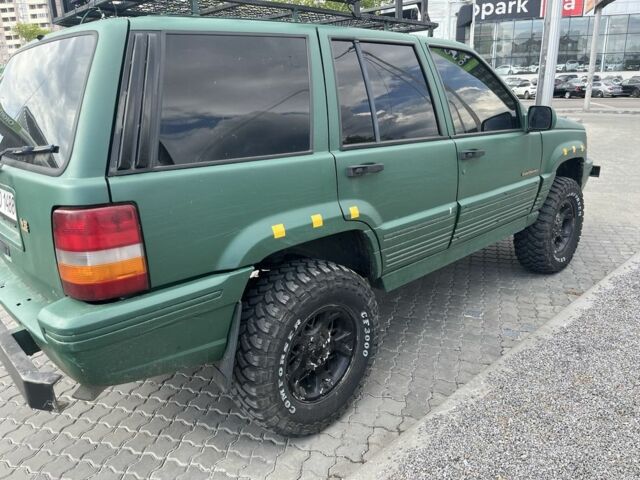 Зеленый Джип Чероки, объемом двигателя 5.2 л и пробегом 360 тыс. км за 5700 $, фото 2 на Automoto.ua