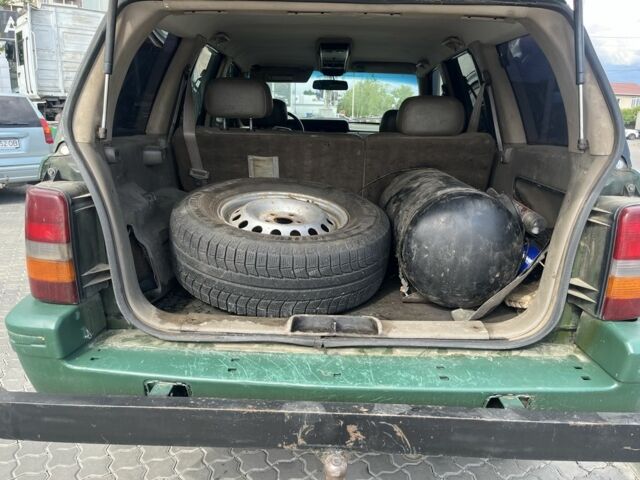 Зеленый Джип Чероки, объемом двигателя 5.2 л и пробегом 360 тыс. км за 5700 $, фото 11 на Automoto.ua