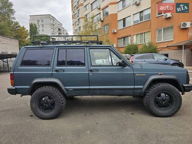 Джип Чероки 1995 в Одессе на Automoto.ua Зеленый Джип Чероки, объемом двигателя 2.5 л и пробегом 220 тыс. км за 6300 $, фото 4 на Automoto.ua