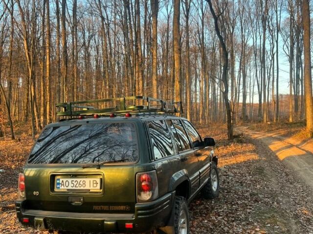 Зелений Джип Cherokee, об'ємом двигуна 5.2 л та пробігом 326 тис. км за 6000 $, фото 3 на Automoto.ua