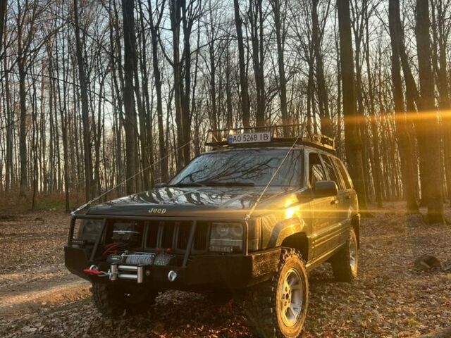 Зелений Джип Cherokee, об'ємом двигуна 5.2 л та пробігом 326 тис. км за 6000 $, фото 1 на Automoto.ua