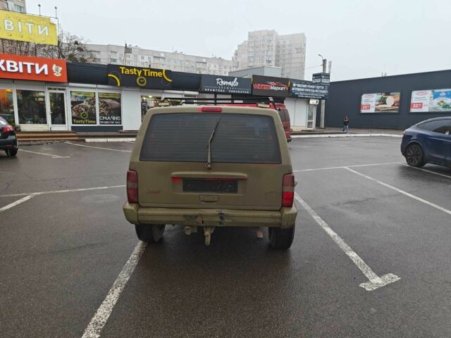 Зеленый Джип Чероки, объемом двигателя 2.5 л и пробегом 334 тыс. км за 3542 $, фото 2 на Automoto.ua