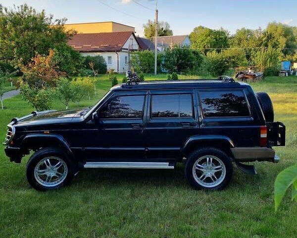 Зелений Джип Cherokee, об'ємом двигуна 4 л та пробігом 370 тис. км за 6700 $, фото 9 на Automoto.ua