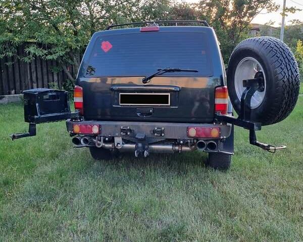 Зелений Джип Cherokee, об'ємом двигуна 4 л та пробігом 370 тис. км за 6700 $, фото 11 на Automoto.ua
