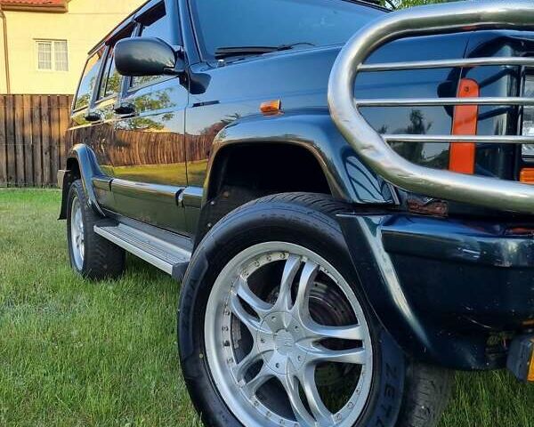 Зелений Джип Cherokee, об'ємом двигуна 4 л та пробігом 370 тис. км за 6700 $, фото 8 на Automoto.ua