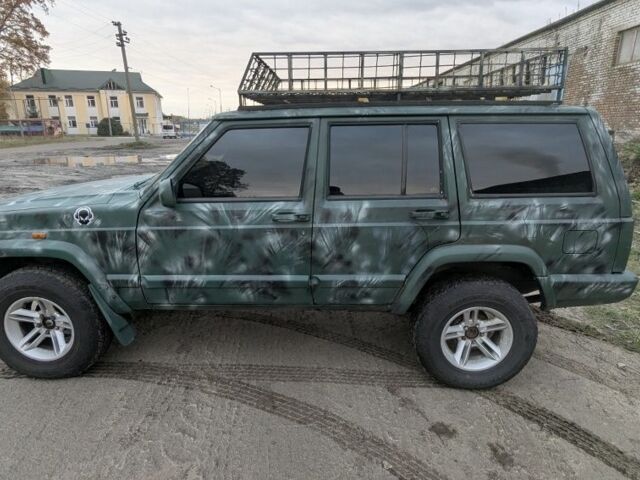 Зеленый Джип Чероки, объемом двигателя 2.5 л и пробегом 308 тыс. км за 3000 $, фото 4 на Automoto.ua